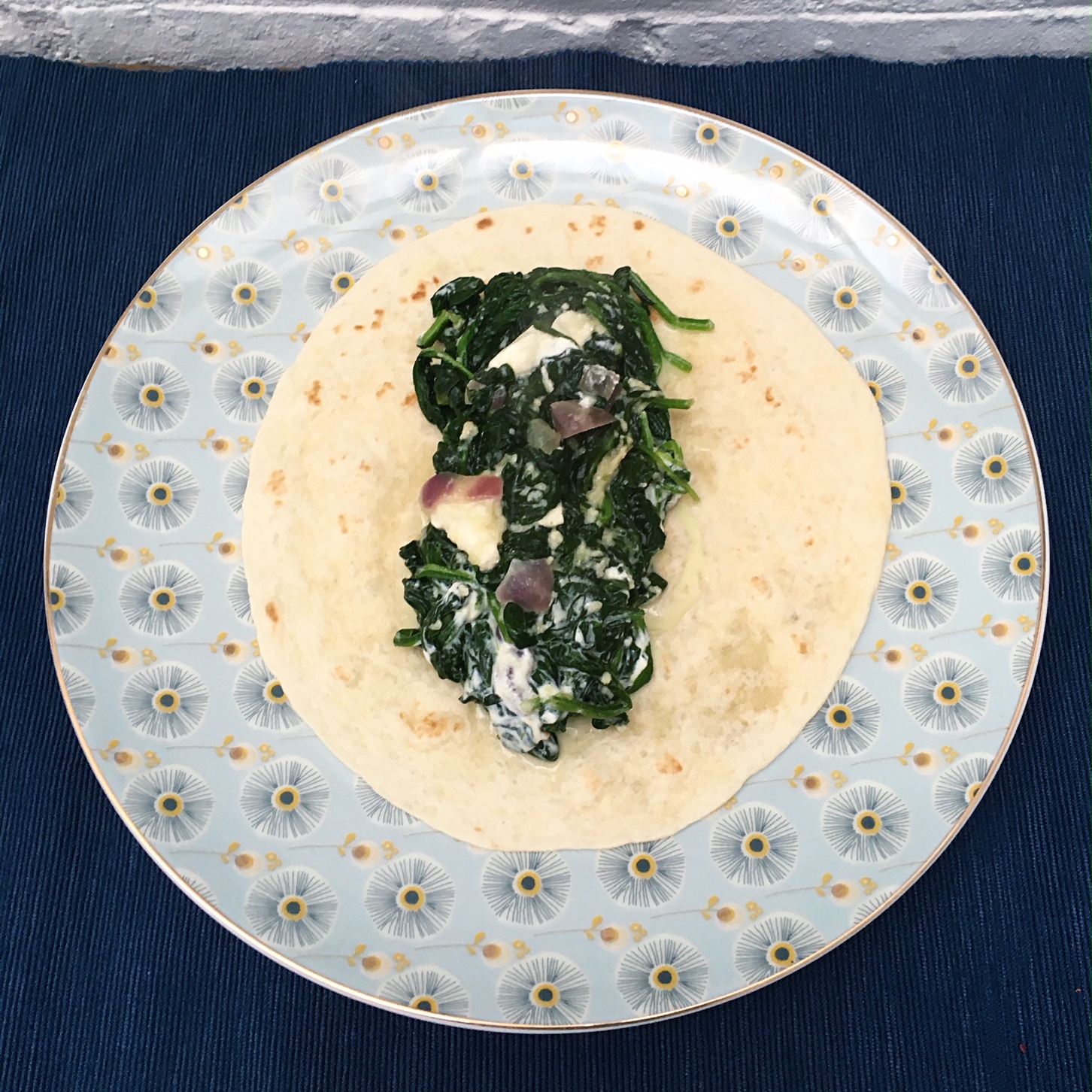 wrap with spinach and goat cheese open